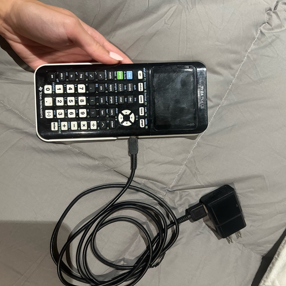 Texas Instruments Black Graphing Calculator with Charger
